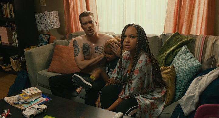 In a scene from "Blindspotting," Miles (played by Rafael Casal) and his girlfriend, Ashley (played by Jasmine Cephas Jones), try to shield their son from the news of police violence in Oakland.