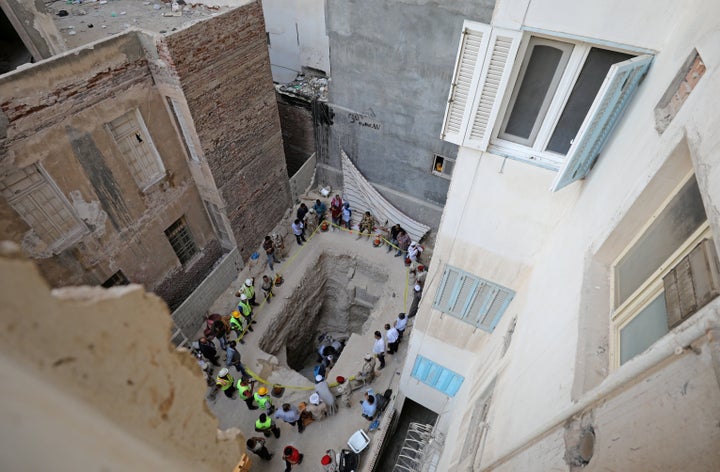 Image result for Egyptian Officials Open Black Sarcophagus, Find 3 Skeletons Inside