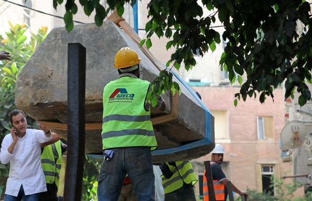 The sarcophagus is moved from the site in Alexandria, Egypt