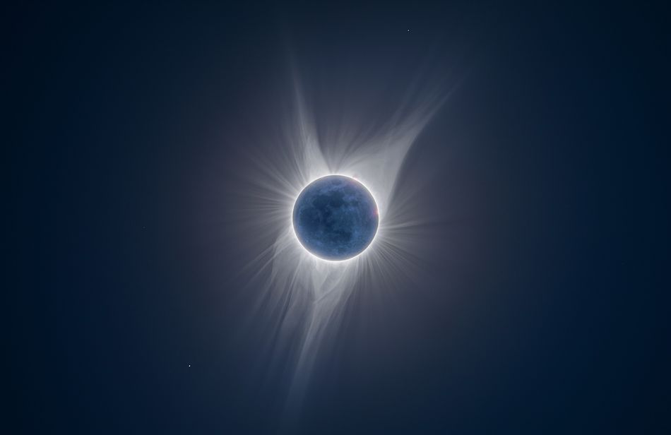 During a solar eclipse the brightness of the solar corona hides the details of the moon By layering 9 exposures ranging from 2 seconds to 1/2000th of a second and with Extreme High Dynamic Range photography or XHDR the image shows not just the radiant solar corona but the newest possible of new moons seen here illuminated by sunlight reflecting off the earth Jackson Hole USA 21 August 2017