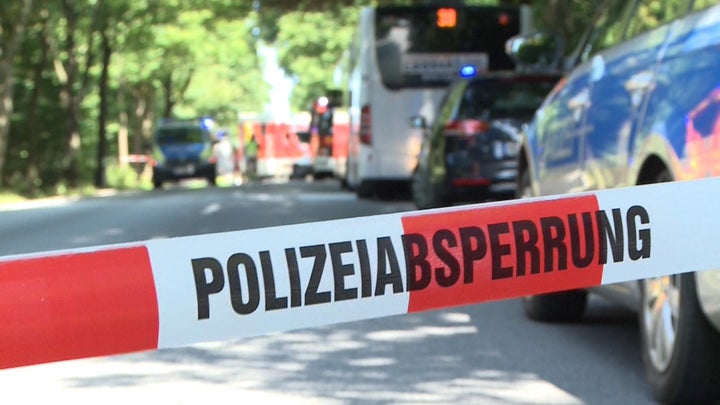 A police ribbon cordons off a street where a public service bus stands in Kuecknitz near Luebeck northern German.