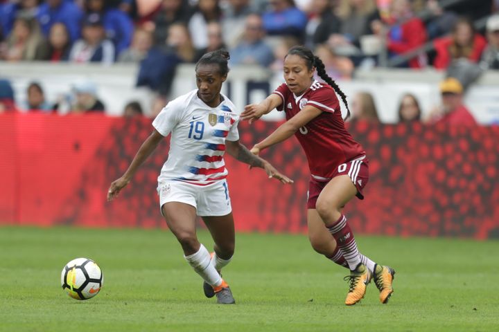 The United States’ Crystal Dunn and Mexico’s Karla Nieto battle for a ball during a friendly match in April. The U.S. and Mexico will begin World Cup qualifying in October.