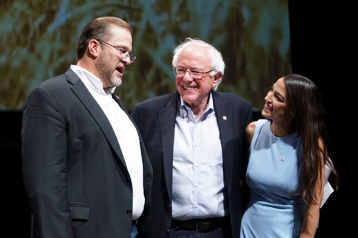 Kansas congressional candidate James Thompson with Sen. Bernie Sanders (I-Vt.) and Alexandria Ocasio-Cortez, a Democratic congressional candidate from New York, at a rally in Wichita, Kansas, on Friday.