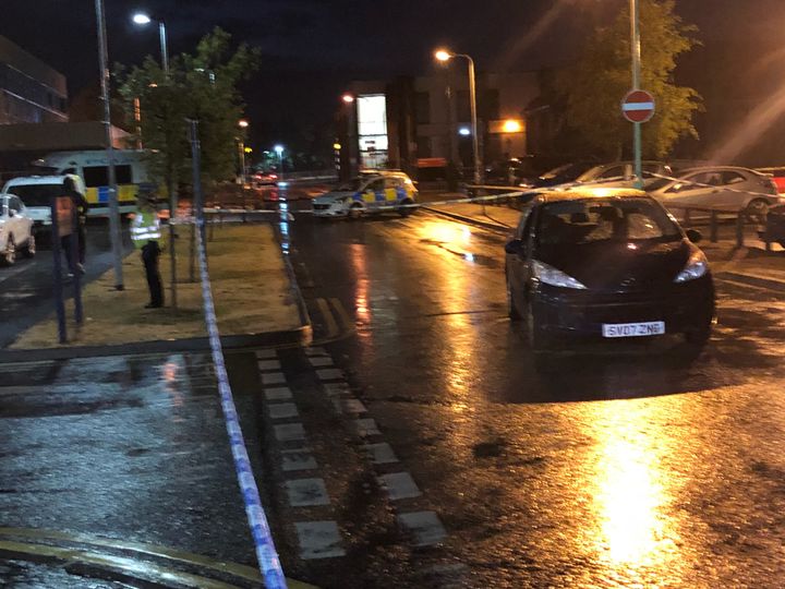 A police cordon was set up around a blue Peugeot outside New Cross Hospital, Wolverhampton.