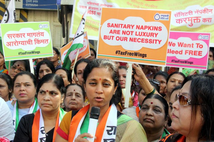 Protesters demonstrate outside an Indian sales tax office in January, demanding exclusion of sanitary napkins from the Goods and Services Tax ambit in Mumbai. The National Congress Party's Supriya Sule, who led the protest march, alleged that the government was insensitive towards the issues concerning women and is "snatching away their basic rights."