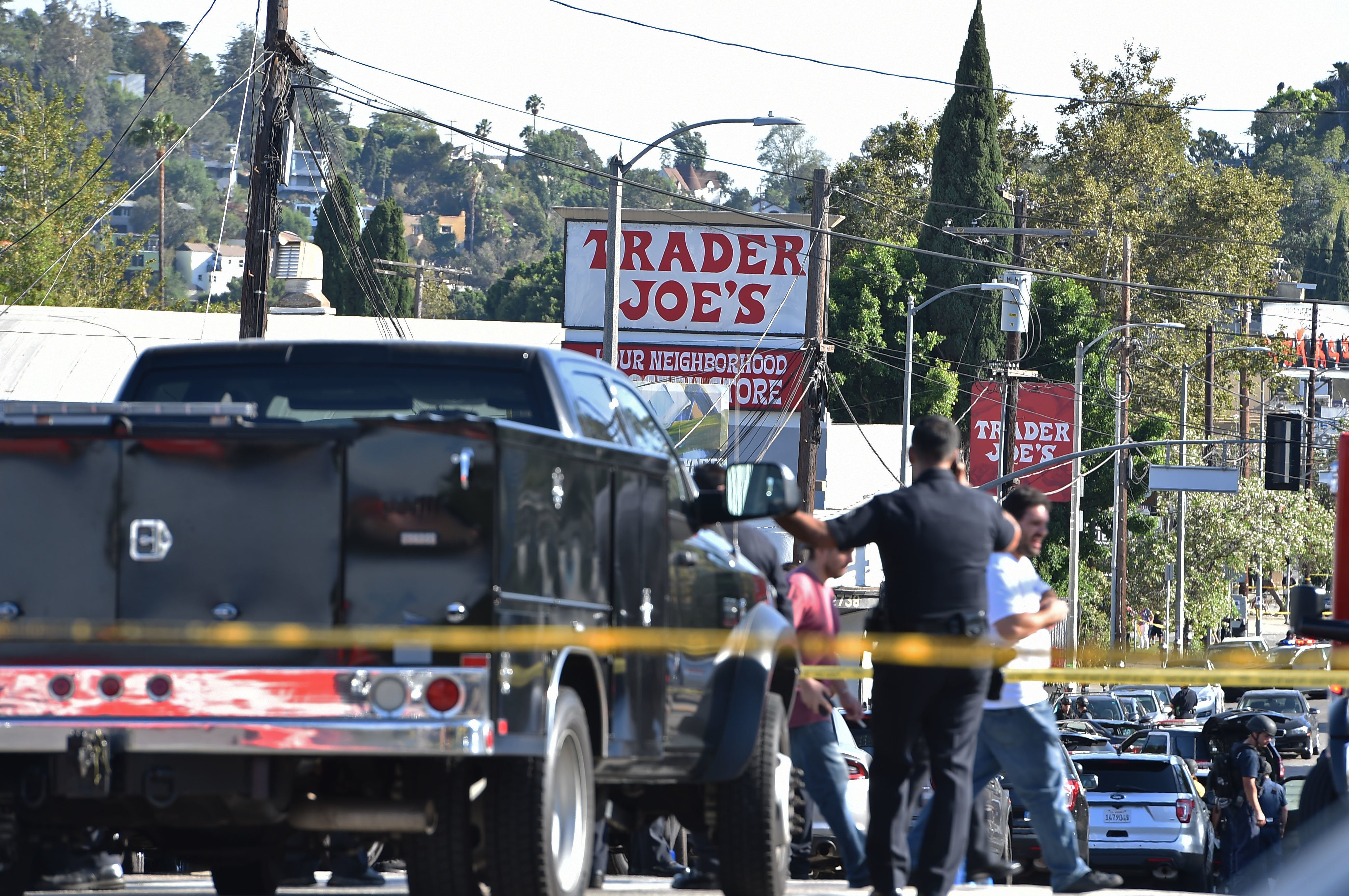 Los Angeles supermarket gunman in custody after police chase