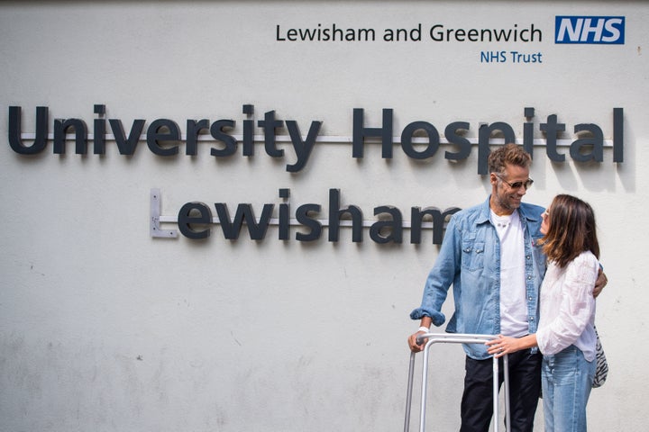 Richard leaving hospital with his wife