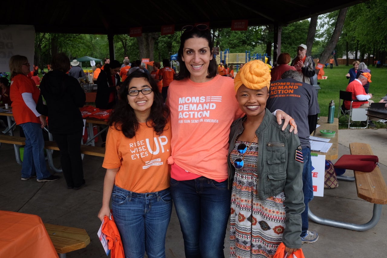 Fayrouz Saad stands a Moms Demand Action rally in Michigan in June 2018.