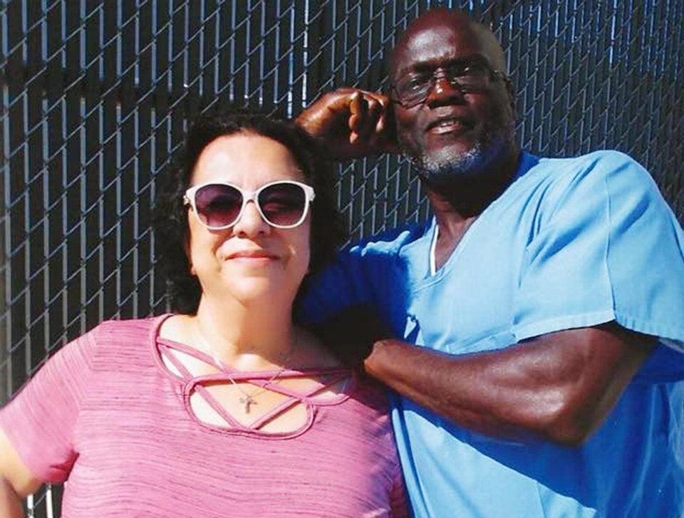 Kenneth Moore with his wife, Cris. 