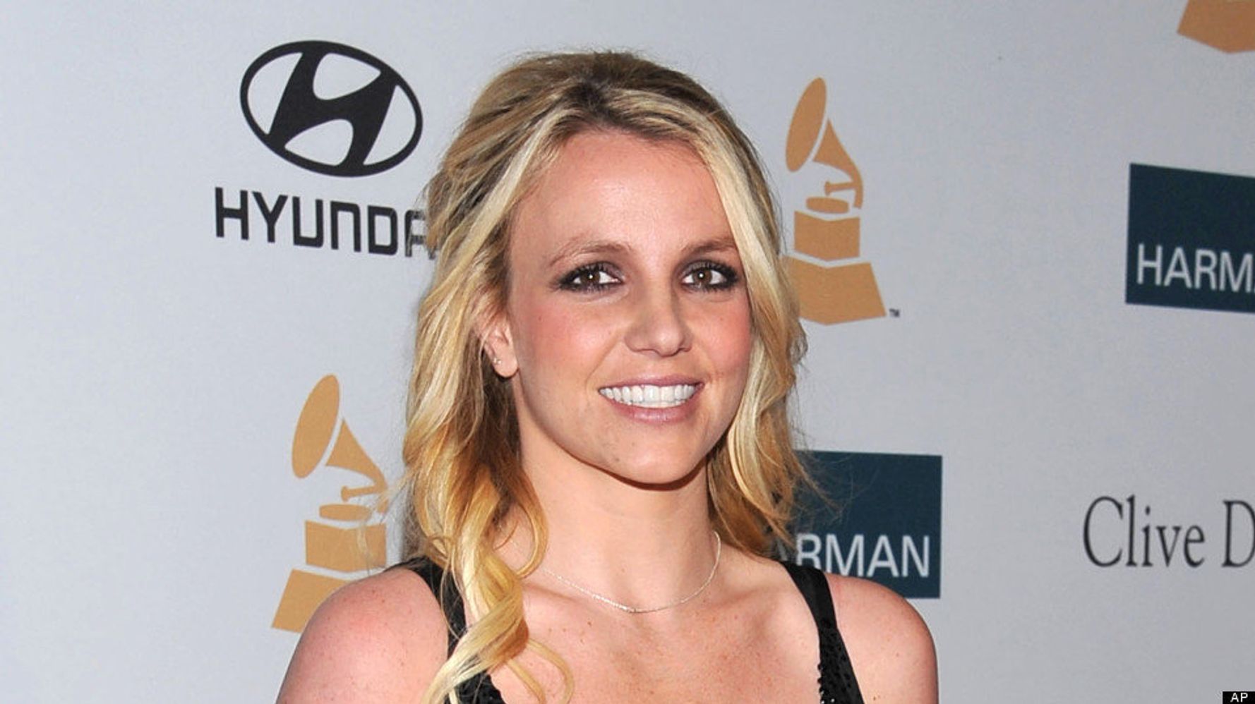 Britney Spears Rocks A Blue Bikini | HuffPost Videos