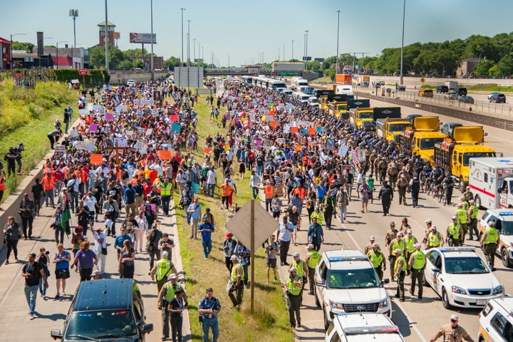 Thousands of activists shut down the Dan Ryan Expressway led by Rev. Michael Pfleger from St. Sabina Catholic Church in Chicago on July 7.