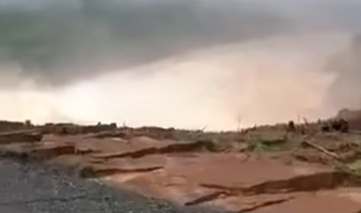 ABC Laos News posted a video showing locals observing fast-flowing water from the side of a river.