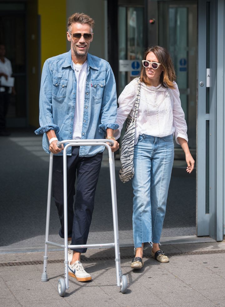 Richard Bacon leaves Lewisham Hospital in south east London with his wife Rebecca.