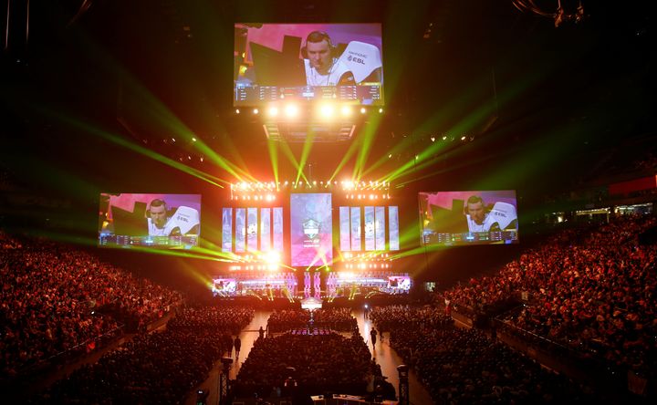 Fans watch the final of the ESL One Cologne Counter-Strike tournament at the Lanxess Arena in Cologne, Germany.