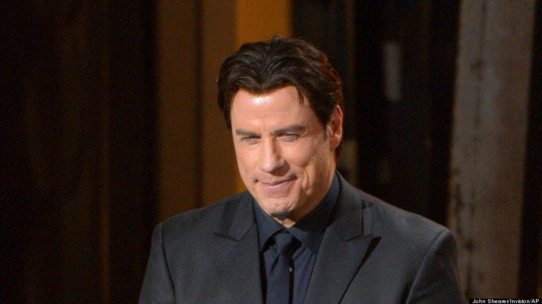 At the Oscars, Travolta and Menzel make light of last year's gaffe