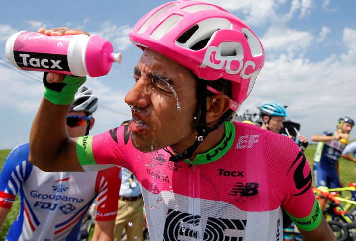 Daniel Felipe Martinez of Colombia, who's riding for team EF Education First - Drapac p/b Cannondale, cleans his eyes after the protest.