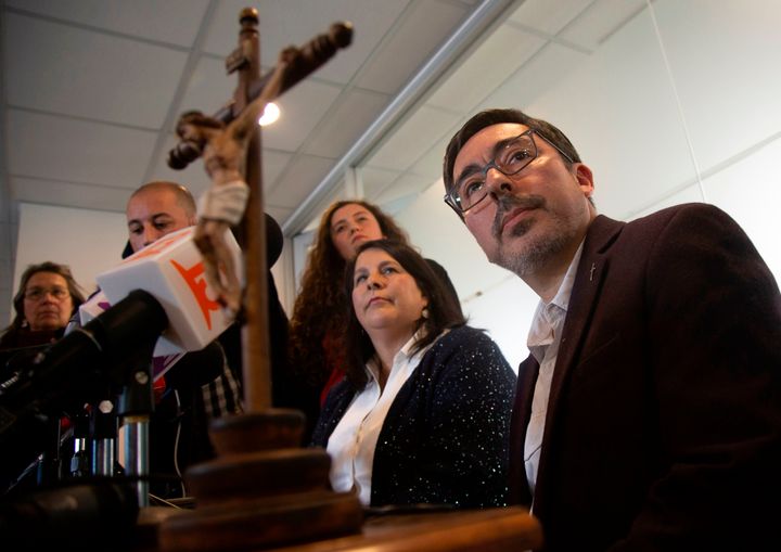 Deacon Jaime Coiro, (right) spokesman for the Episcopal Conference of Chile, speaks during a press conference in Santiago, on July 23, 2018. Chile is now investigating 158 members of the country's embattled Catholic Church -- both clergymen and lay people -- for perpetrating or concealing the sexual abuse of children and adults, prosecutors said Monday. 