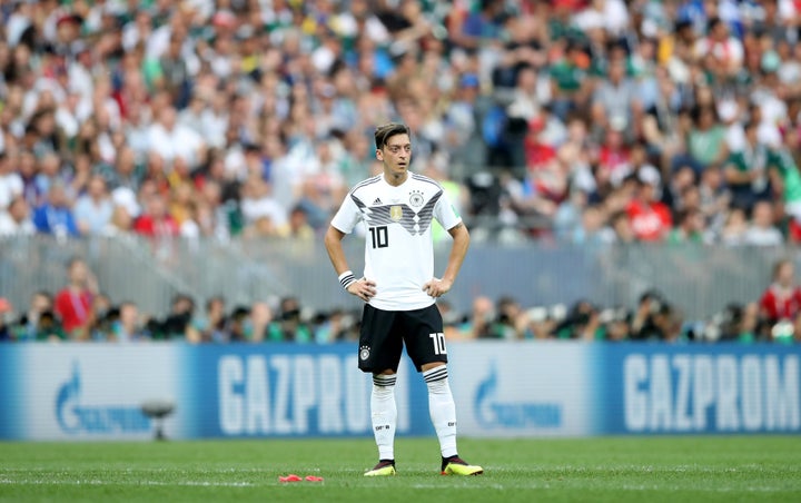 Germany's Mesut Özil retired from national team play on Sunday, citing "racism and disrespect" from the team's fans and top soccer officials. 