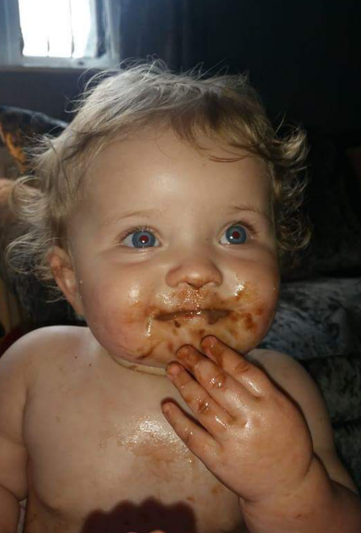 This is the face of someone who enjoyed that cake very much. 