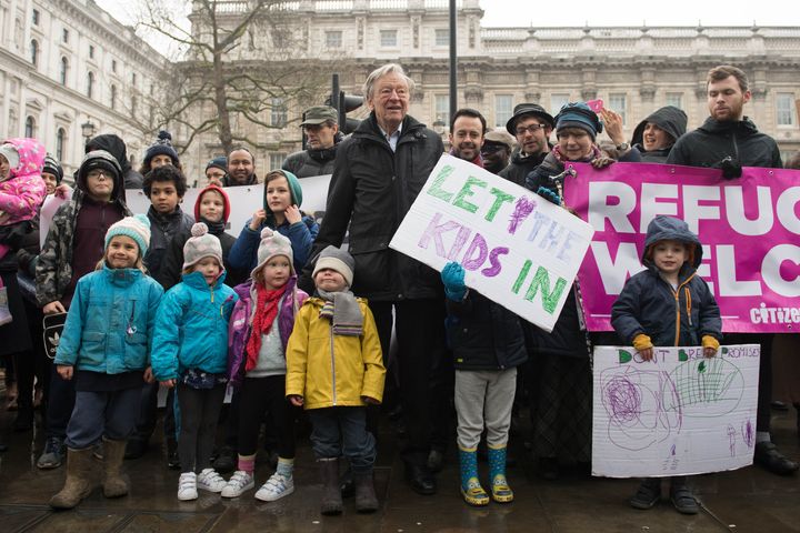 Labour peer Lord Dubs and campaigners protesting the decision to close the Dubs scheme.