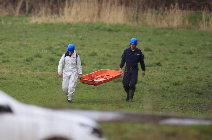 <strong>Police at the scene in a field near George Street in Heywood, Greater Manchester, after the body of a newborn baby was found in April.</strong>