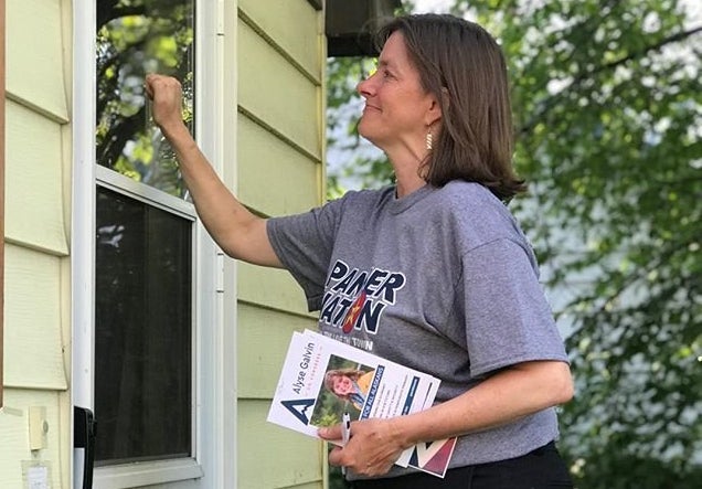 Here's Alyse Galvin knocking on someone's door in Fairbanks, Alaska.