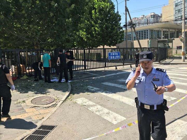 A police officer is seen near the U.S. embassy in Beijing on July 26, 2018.