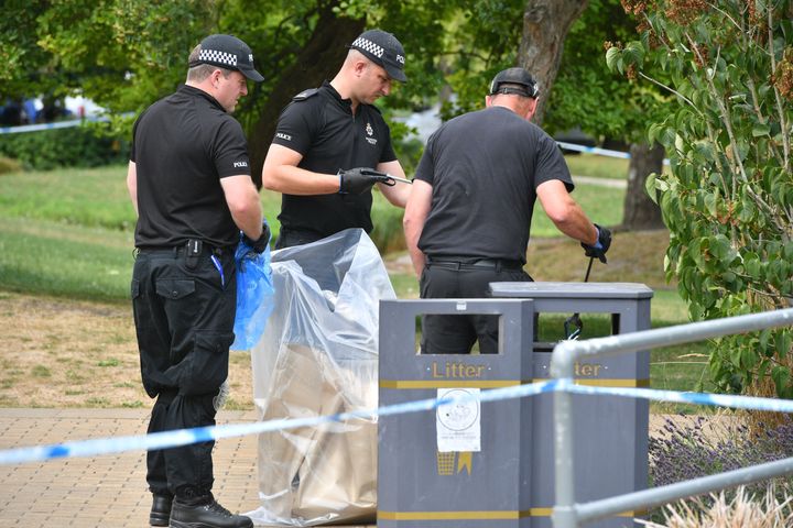 Police bag items as they conduct searches of Queen Elizabeth Gardens, Salisbury, where Dawn Sturgess visited before she fell ill after coming into contact with Novichok.