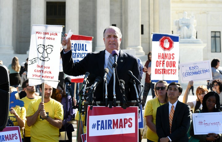 Rep. Dan Kildee (D-Mich.) speaks during an anti-gerrymandering demonstration outside the Supreme Court in Washington in