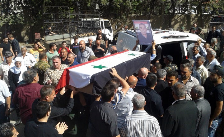 More than 200 people were killed in a series of suicide bombings launched by Islamic State fighters on the eastern and northe