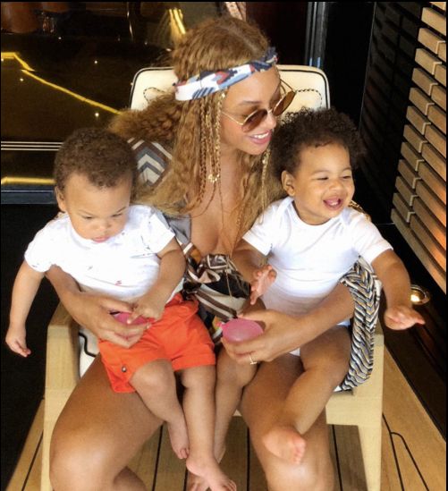 Beyoncé with her twins, Sir and Rumi. 