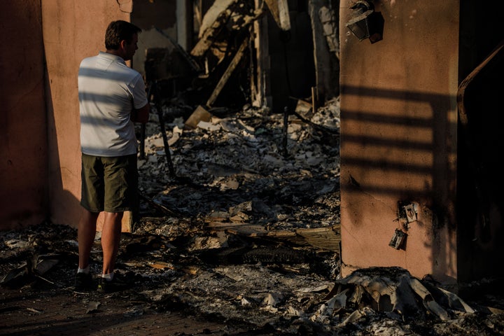 Eric Durtschi takes in the reality of his home destroyed by wildfire, in Goleta, California, on July 7.