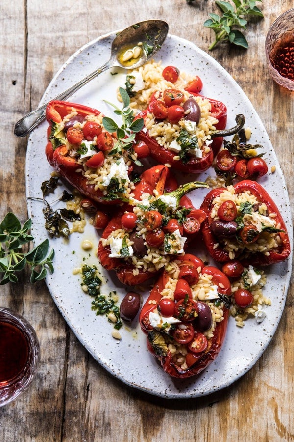 <strong>Get the&nbsp;<a href="https://www.halfbakedharvest.com/greek-orzo-stuffed-red-peppers/" target="_blank">Greek Orzo St