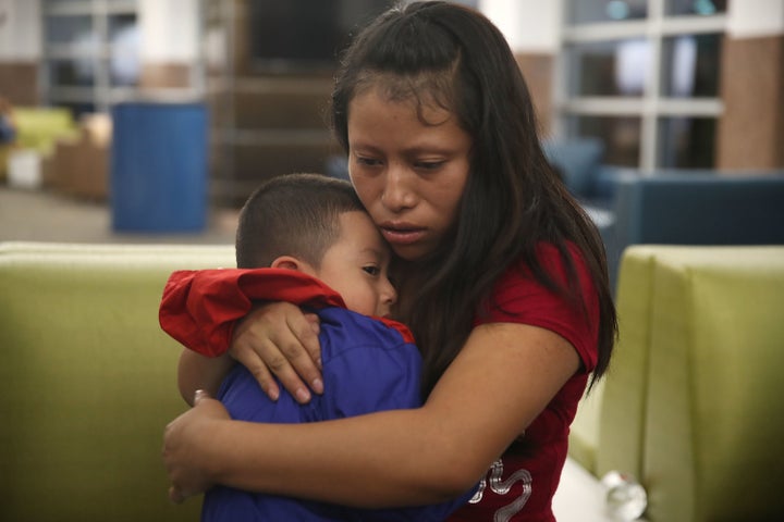 A Guatemalan woman is reunited with her son in El Paso, Texas, on July 26 after they were separated for a month under President Donald Trump’s zero tolerance immigration policy.