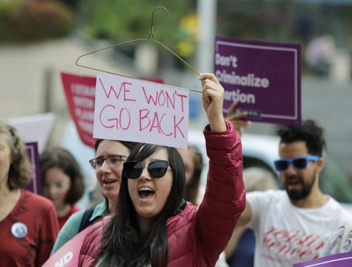 Hillary Namba takes part in a protest in Seattle against Trump and Kavanaugh, July 10, 2018.
