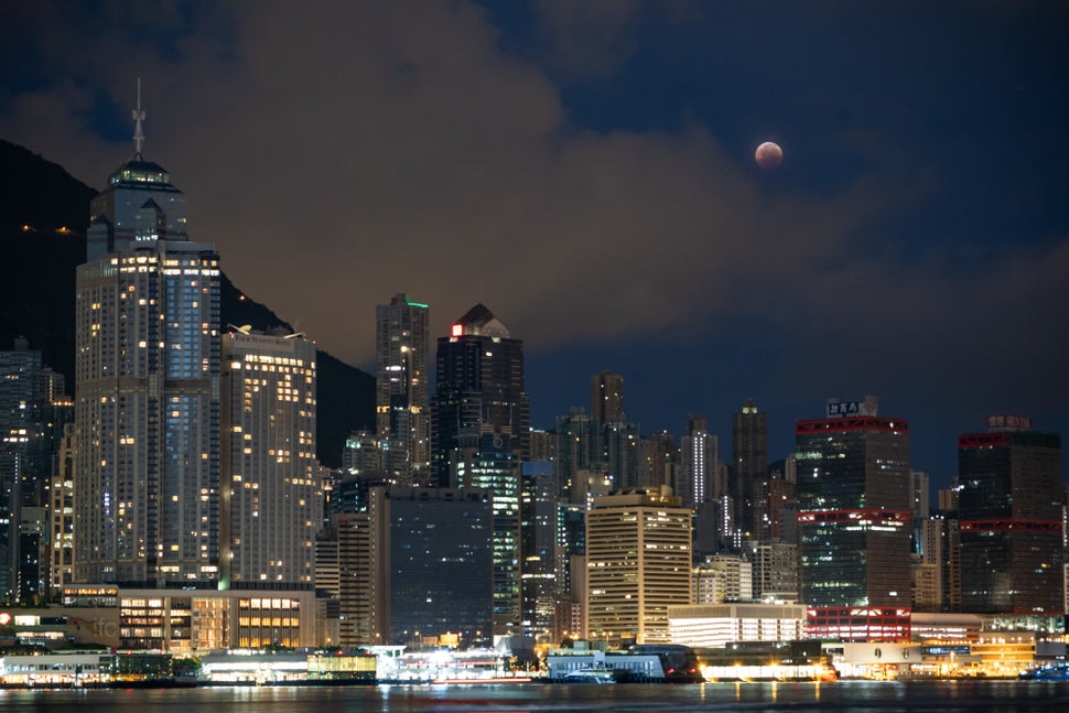 Above the skyscrapers of Hong Kong.