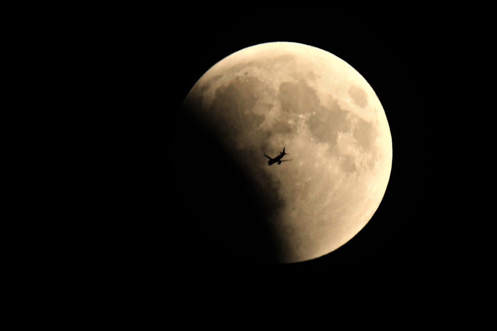 Behind the silhouette of an airplane in Van, Turkey.