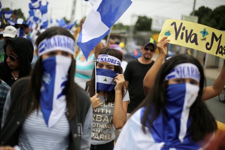 Demonstrators take part in a march to demand the ouster of Ortega in Managua on July 22.