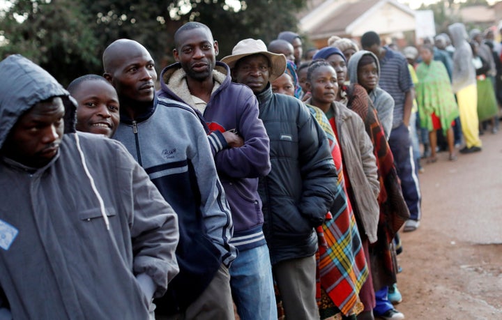 Voters lined up to cast their ballots in Zimbabwe's general elections in Harare on Monday.