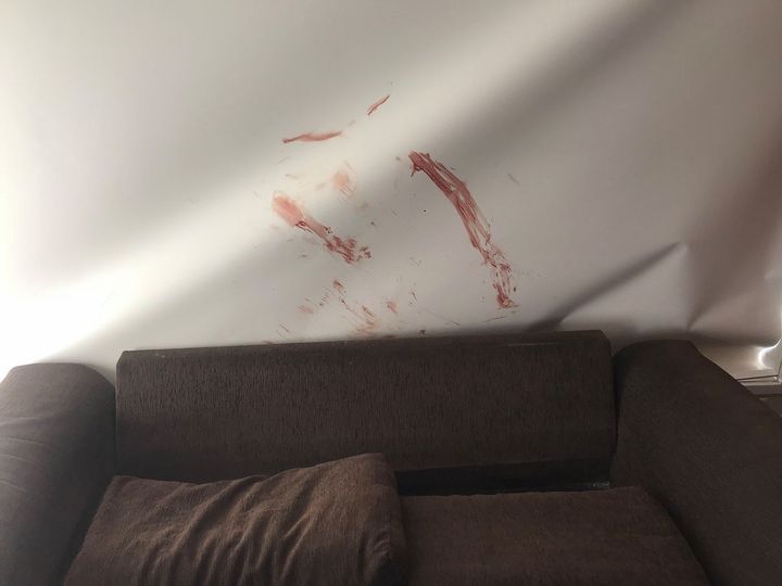 Injuring himself on the broken glass, he left the rooms of the house 'looking like a scene from Psycho' 