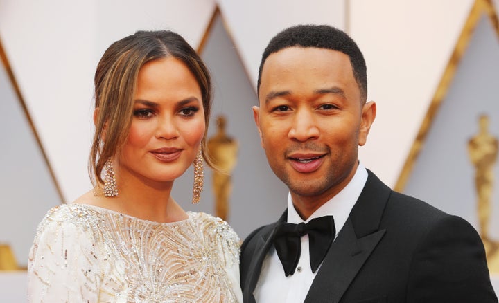 Chrissy Teigen and John Legend at the Academy Awards in 2017. 