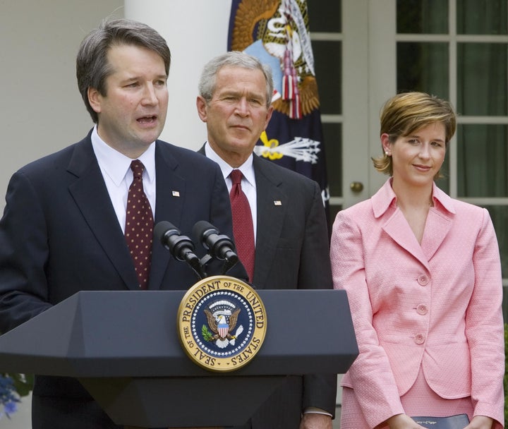 Brett Kavanaugh with then-President George W. Bush and wife Ashley Kavanaugh in June 2006.