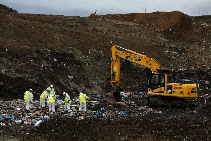 Police search a landfill site in Milton, Cambridgeshire, last year.