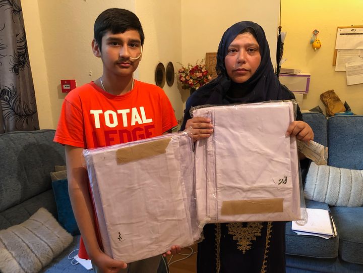 Iram Shahzadi and her son, Muhammed, who were sent funeral shrouds in the post