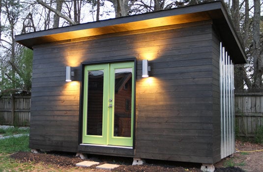 This shed-style addition can serve as an office or craft room.