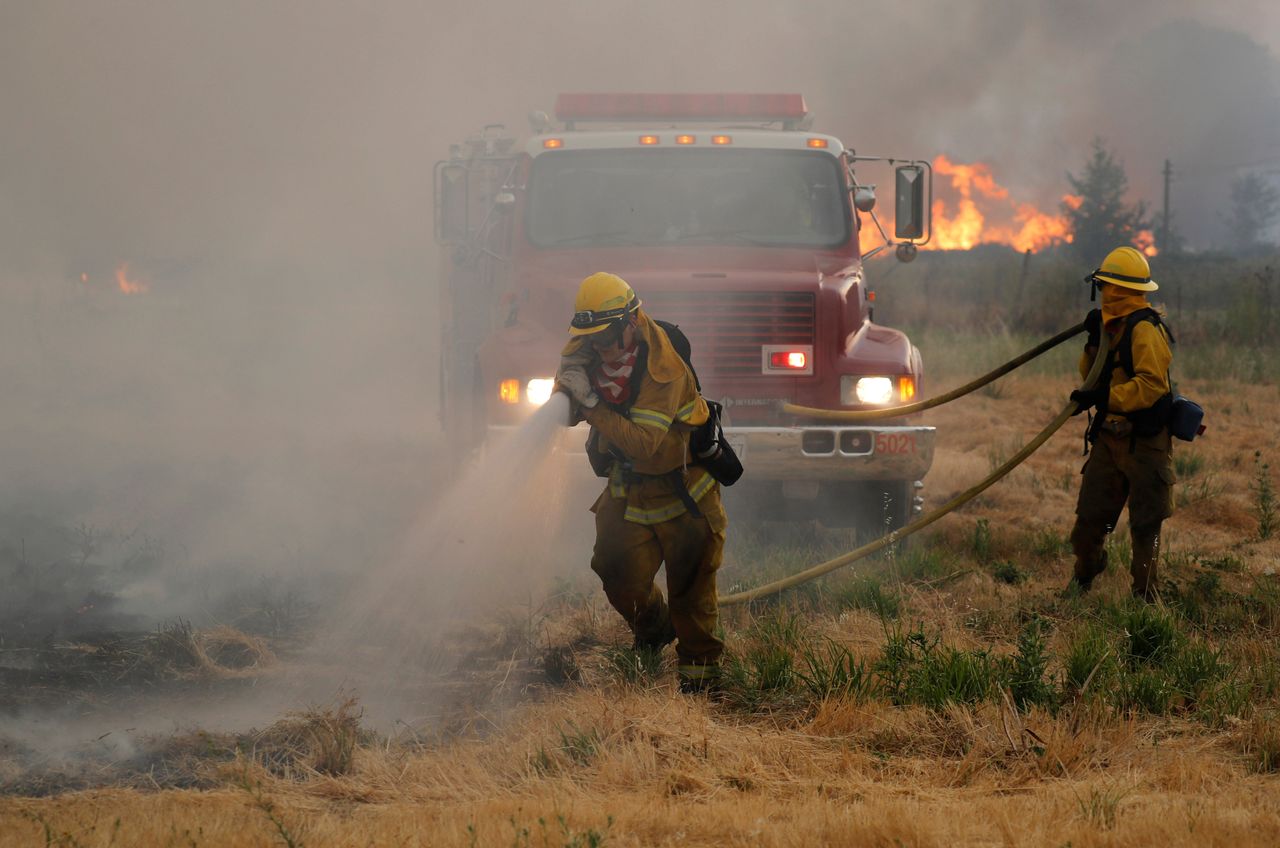 Firefighters attacked hotspots to slow the spread of the River Fire.