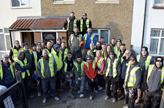 The team working on the Jenkins family's house. All of them took time off work to help the family out. 