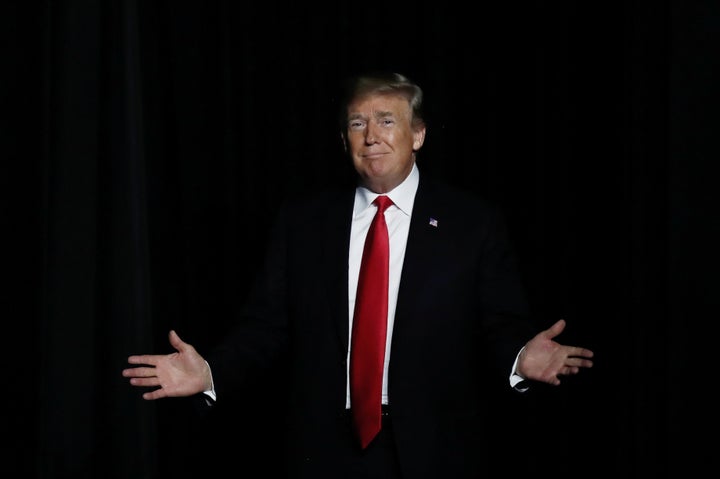 Donald Trump reacts as he is introduced at the Make America Great Again Rally at the Florida State Fairgrounds in Tampa, Florida, U.S., July 31, 2018.