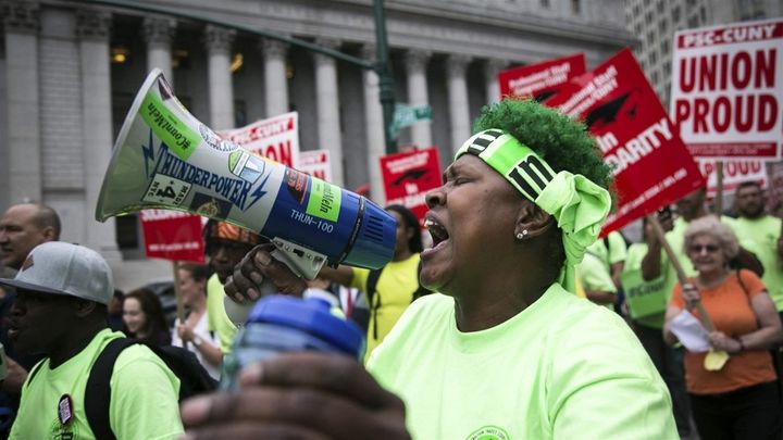 Union activists and supporters rally in Lower Manhattan against the U.S. Supreme Court’s ruling in the Janus case. New York state policymakers have taken action to protect unions from the impact of the decision.