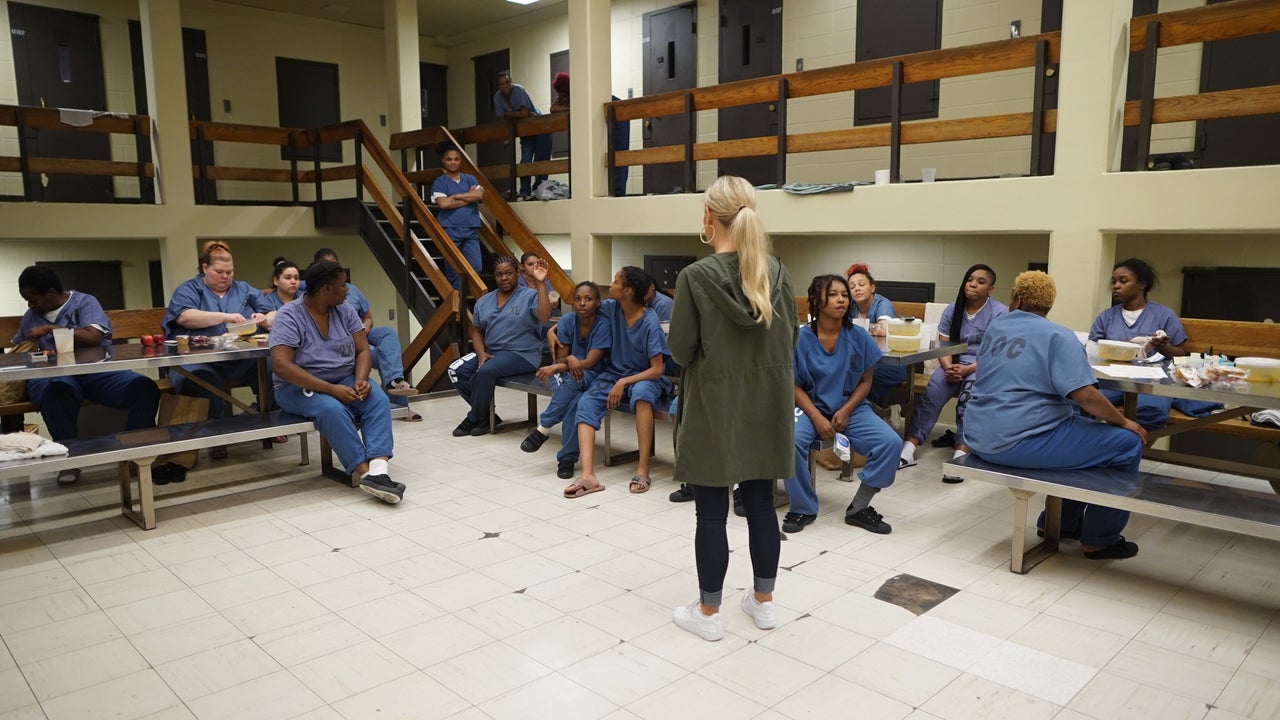 Jen Dean, an organizer with Chicago Votes, asks women in Cook County jail if they have questions about getting registered.